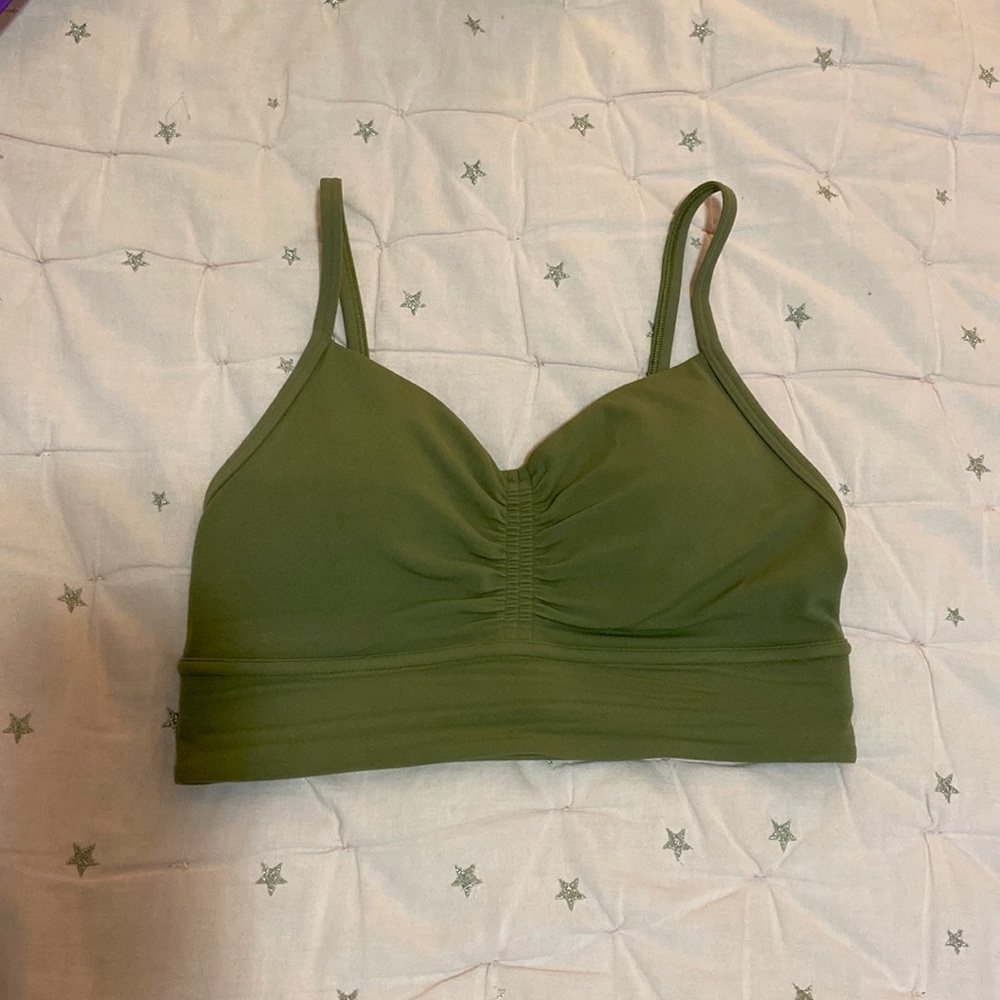 Lululemon bra with insert cups for support and lift. soft fabric. Never worn.